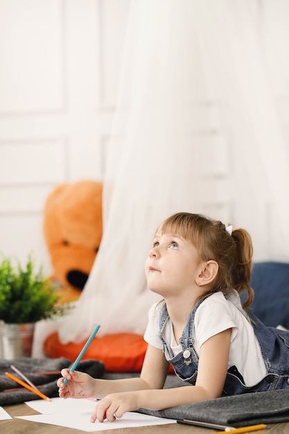 Childhood. young girl at home