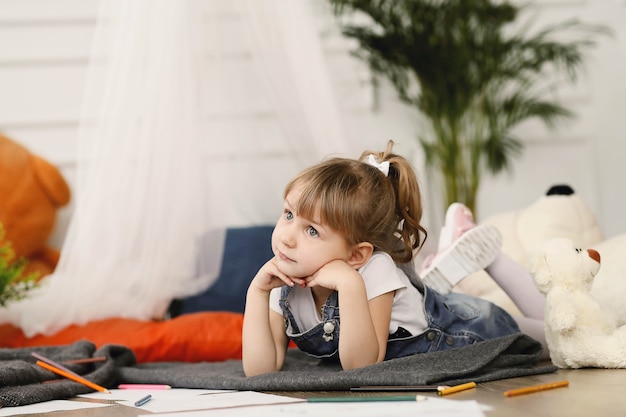 Free photo childhood. young girl at home