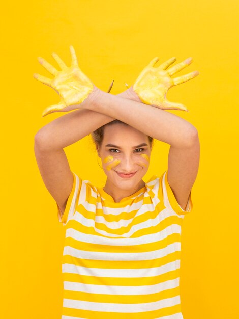 Childish woman with painted hands