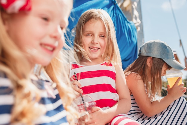 The children on board of sea yacht