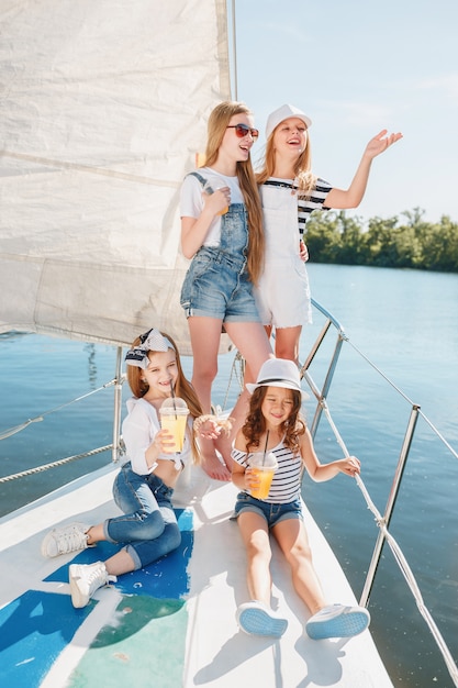 Free photo the children on board of sea yacht