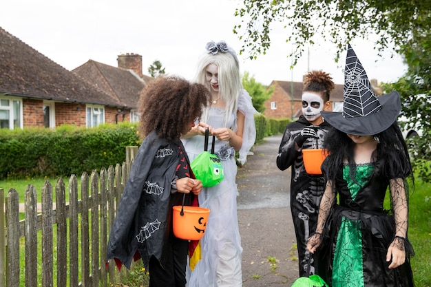 Children in costumes going to trick or treat