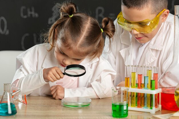 Children doing experiments in laboratory
