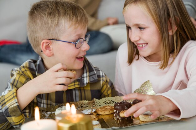 Children eating homemade sweets