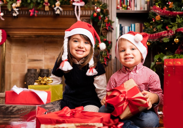 Children on the floor smiling