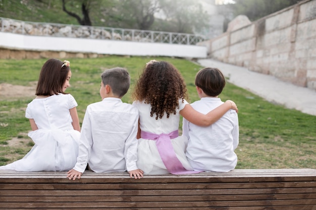 Free photo children getting ready for their first communion