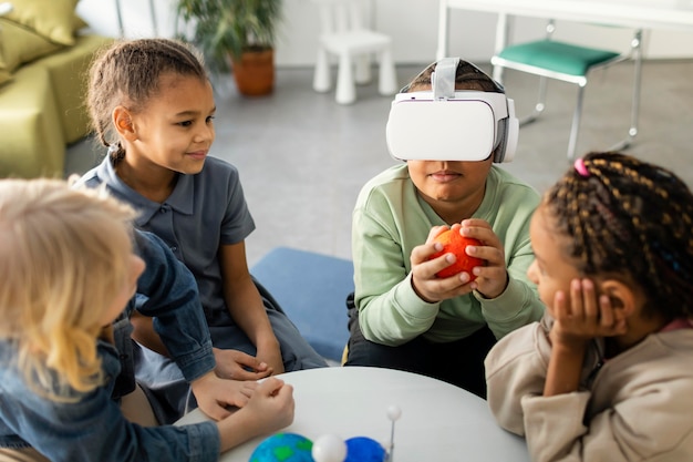 Free photo children learning about the universe