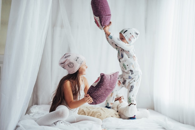 Free photo children in pajamas