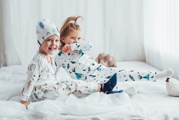 Free photo children in pajamas