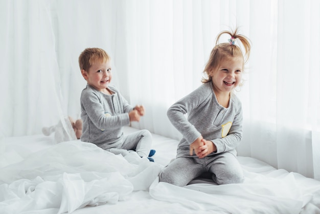 Free photo children in pajamas