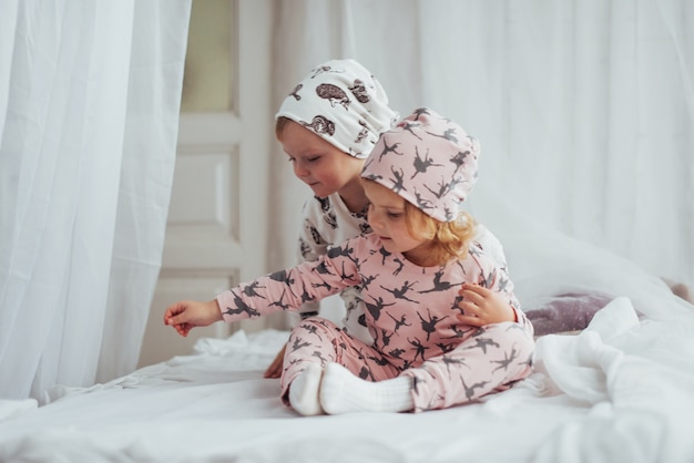 Free photo children in pajamas