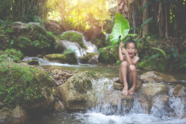 Children play happily in the stream