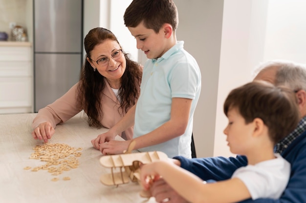 Children playing with their grandparents