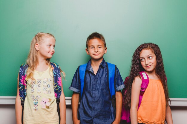 Children posing in classroom