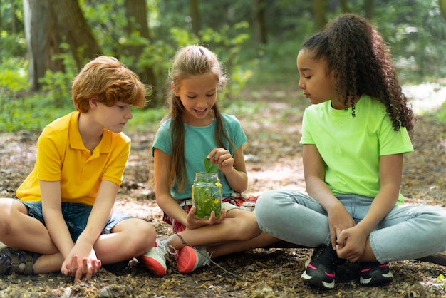 Free photo children spending time together in the nature