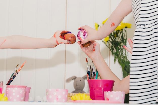 Children touching eggs