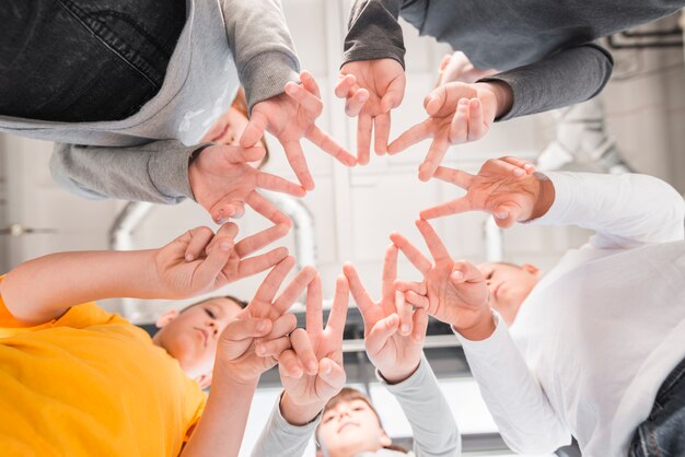 Children with their hands together