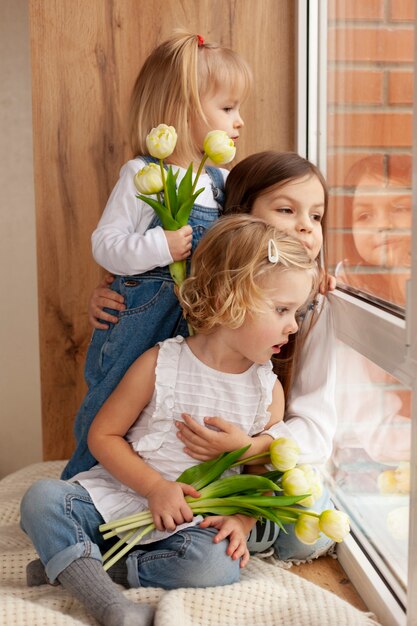 Childrens with flowers