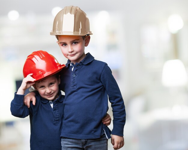 Childs with work helmets