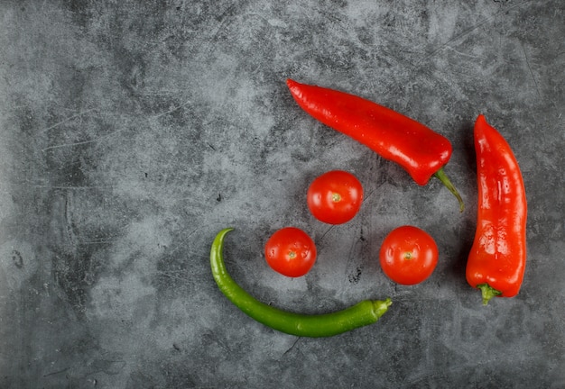 Chilies and tomatoes . Top view.