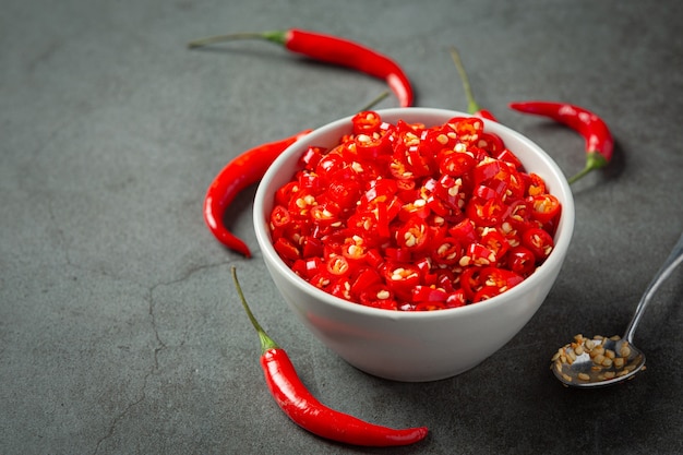 Free photo chilli pepper on dark surface