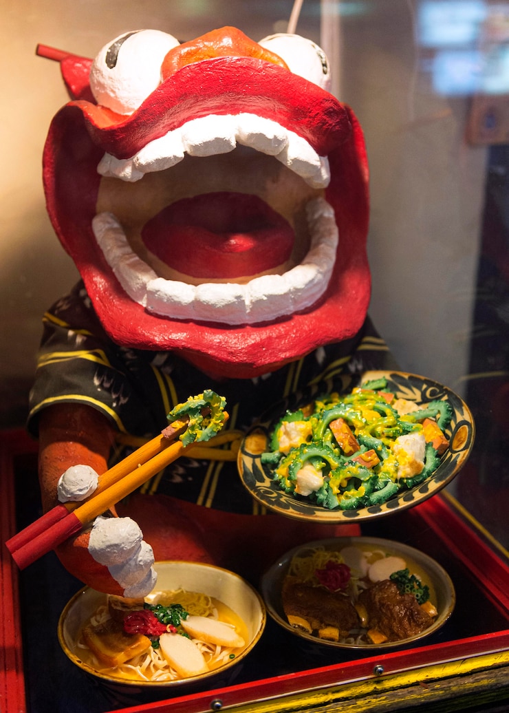 Free Photo chinese dragon character presenting traditional food