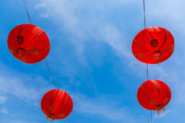 Chinese lantern and skylook up view of chinese lantern against blue sky