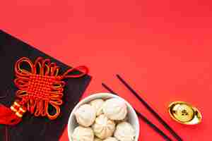 Free photo chinese new year dumplings with chopsticks