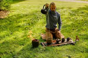 Free photo chinese tea ceremony in a park. tea drinking in the open air.