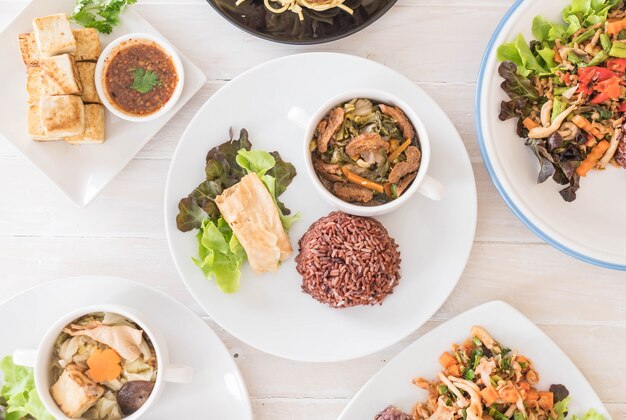 Free photo chinese vegetable stew and tofu with berry rice