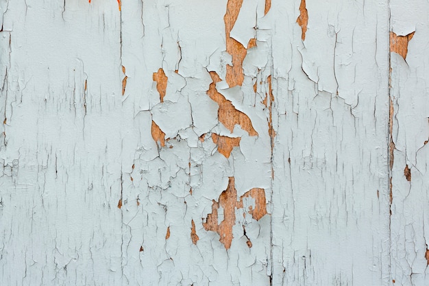 Free photo chipping paint on worn wooden surface