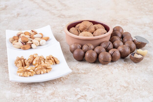 Chocolate balls, walnuts, almonds and pistachios 