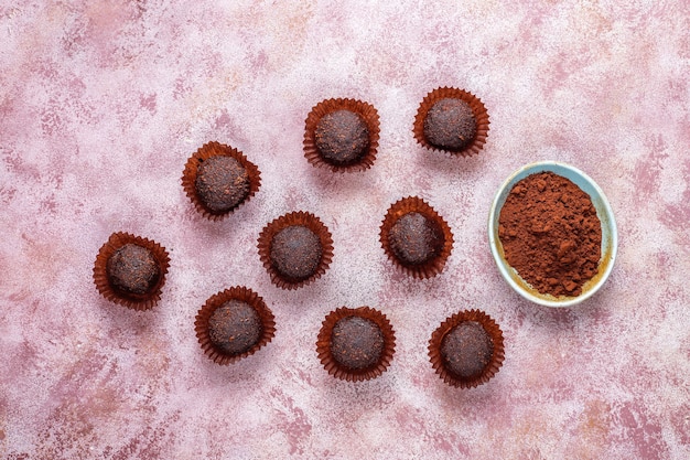 Chocolate balls with cocoa powder.