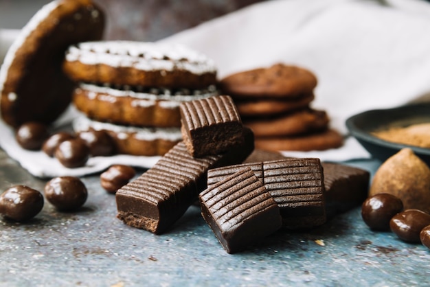 Chocolate bar and balls with baked cookies