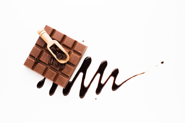 Chocolate bar with wooden scoop