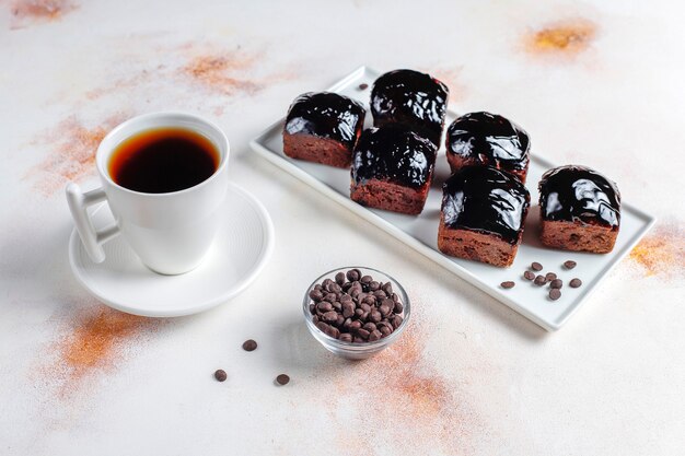 Chocolate cake bites with chocolate sauce and with fruits,berries.