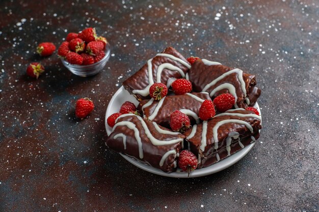 Chocolate cake roll with raspberry jam and butter cream.