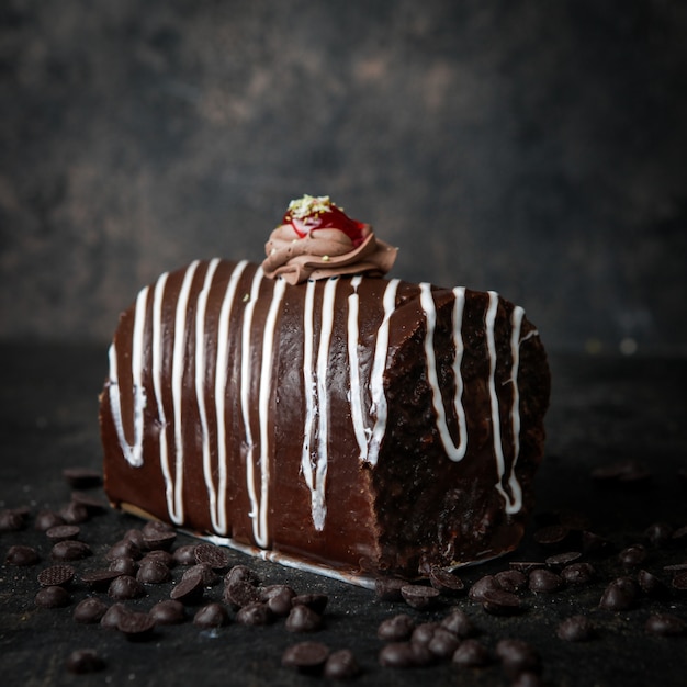 chocolate cake with chocolate drops and cream