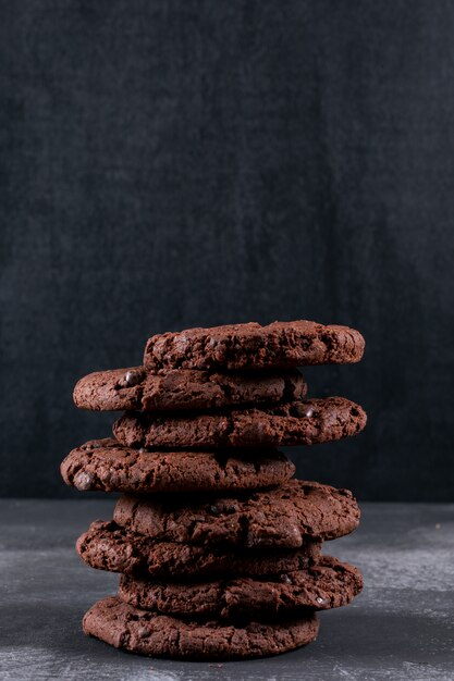 Chocolate cookies on dark table