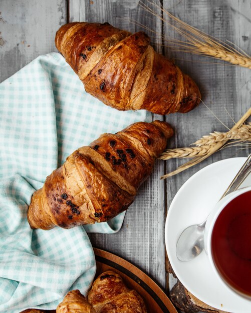 chocolate croissant on table