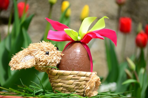 Chocolate egg with decorative bows