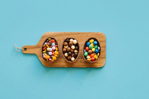 Chocolate eggs with pellets on board