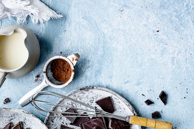 Chocolate ganache truffle ingredients in a kitchen flat lay