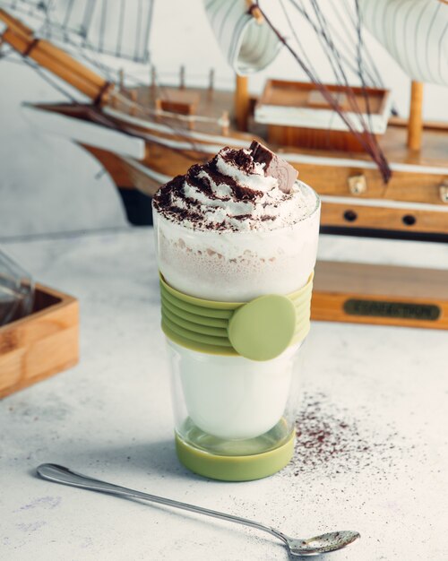 Download Glass Of Chocolate Milkshake On Yellow Premium Photo PSD Mockup Templates