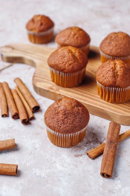 Chocolate muffins on light brown background ,Selective Focus.