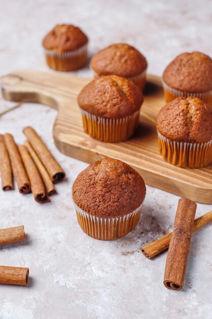 Chocolate muffins on light brown background ,Selective Focus.