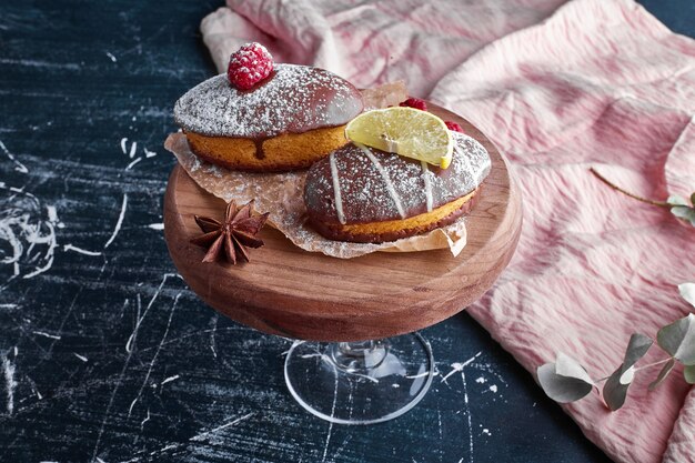 Chocolate muffins with raspberry and lemon. 