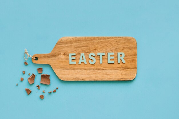 Chocolate near Easter writing on cutting board