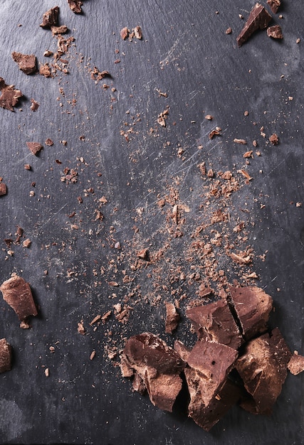 Chocolate portions on wooden table