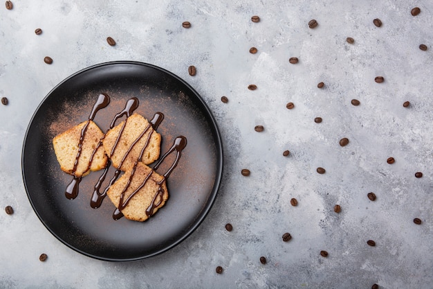 Free photo chocolate sauce on bread flat lay